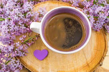 Cup of coffee and spring flowers