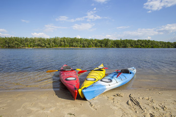Camping on the beach.Kayak on the beach on a sunny day.