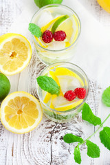 Fototapeta na wymiar Lemonade in a glass with mint