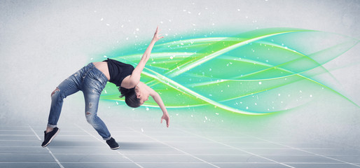 Hip hop dancer posing with green lines