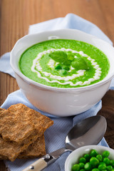 Green peas soup in a bowl