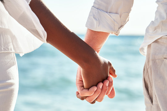 Multiracial couple hands