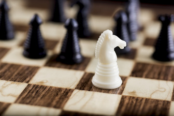 caught in a trap, encircled in the game as in business.