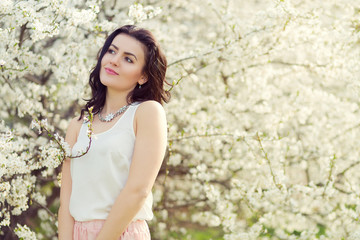 Beautiful woman in a spring park