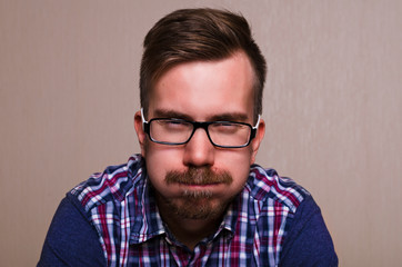 Obraz premium student, man funny middle age guy with eyeglasses puffing his cheeks. A lot of problems keep man in depression