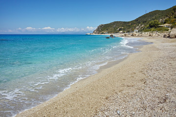 Fototapeta na wymiar Stones over the sand of Katisma Beach, Lefkada, Ionian Islands, Greece