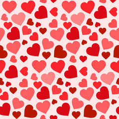 Seamless pattern with pink and red hearts. Vector image