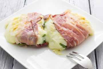Tomino cheese with bacon