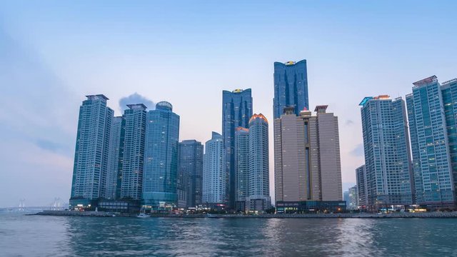Day to night time lapse at Busan city skyline, South Korea
