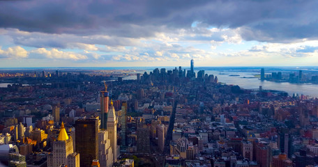 Manhattan Skyline, New York. View of downtown and the Hudson River on a cloudy evening.
