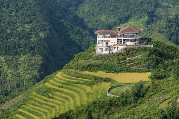 Naklejka premium The coffee shop on the summit beautiful landscape of Fan Si Pan mountain view of SAPA Vietnam when look at from cliff side coffee shop.