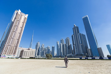 Fototapeta na wymiar Dubai skyline with residential skyscrapers and Burj Khalifa, UAE