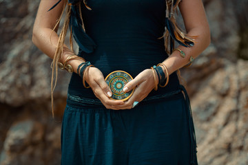 close up of boho girl hands with tarot cards