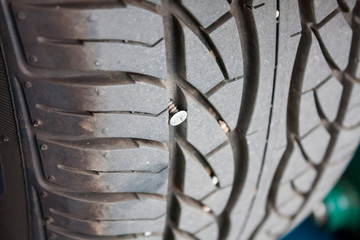 metallic nail in car tyre