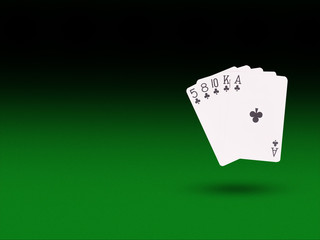  flush playing cards on the poker table