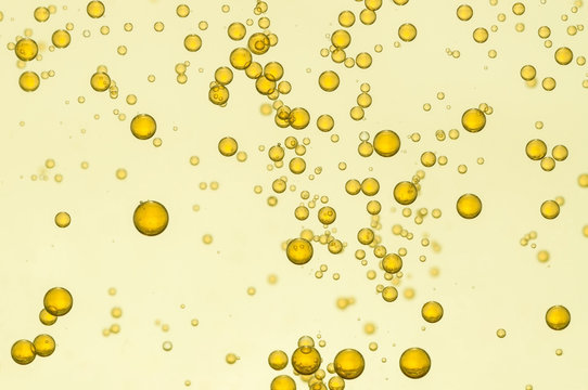 Golden fizz bubbles