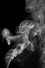 Abstract gray smoke from the incense sticks.