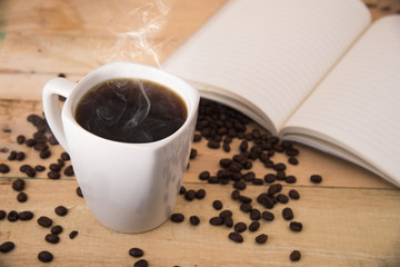 Cup of coffee on a wooden table