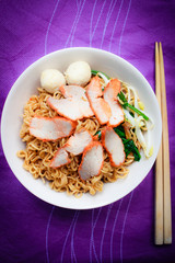 Noodle soup with barbecue pork.