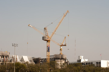 Fototapeta na wymiar Yellow hoisting crane.