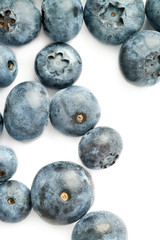 Bilberry or blueberry over white background
