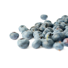 Pile of Bilberry or blueberry over isolated white background