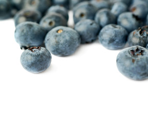 Pile of Bilberry or blueberry over isolated white background