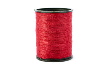 Spool of thread isolated over the white background