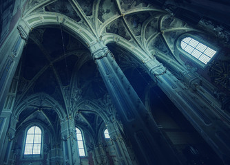 sun rays beaming through the old window of Latin Cathedral