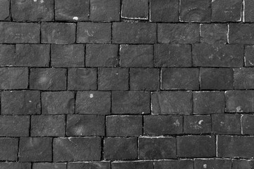 Dark paving stone roadway