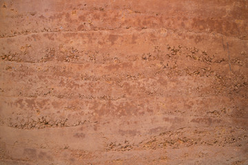 red soil wall texture. background