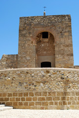 View of the Moorish tower behind the castle, Antequera, Spain.
