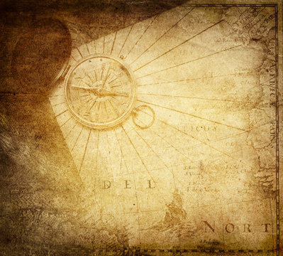 Fototapeta Vintage golden compass with nautical map background.