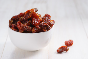 dried tomatoes in white bowl