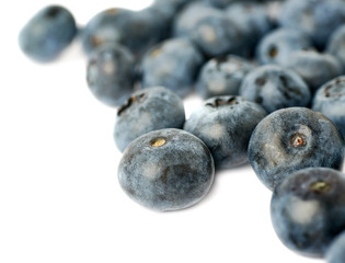 Pile of Bilberry or blueberry over isolated white background