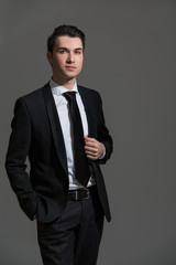 Businessman on grey background