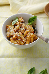 pasta with sauce in white bowl