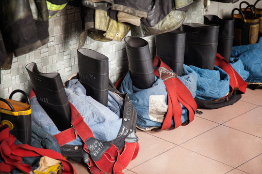 Firefighter's Boots On Floor At Fire Station
