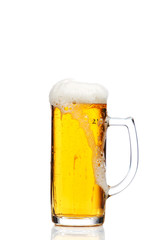 Glass of beer isolated on white background