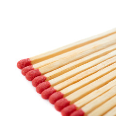 Pile of Wooden matches isolated over the white background
