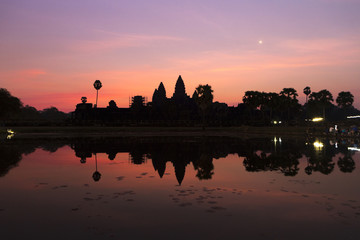Fototapeta na wymiar Sunrise in Angkor Wat, a UNESCO Heritage Site in Cambodia