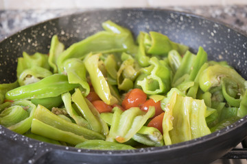 peperonata or peppers fried in pan