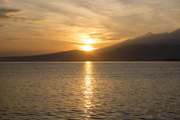 Naklejka premium Awesome sunrise and still water on Gili Air Island, Indonesia