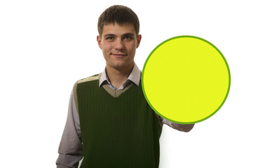 The young man of European appearance in a shirt and a green vest