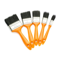 Pile of Paint brushes over isolated white background
