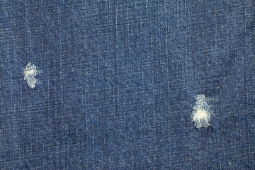 Blue torn denim jeans texture, Jeans background.