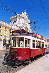 red retro tram Commerce Square in Lisbon