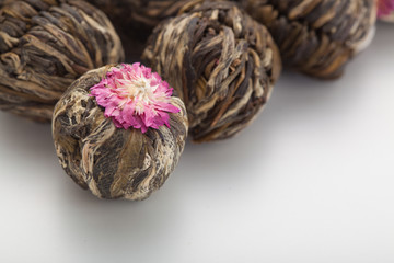Aromatic flower green chinese tea or blooming tea on studio background