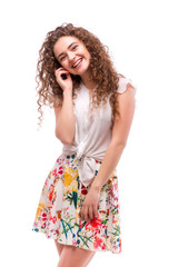 Beautiful curly girl posing on white background