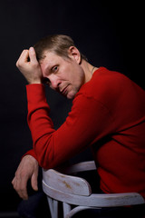 portrait of forty-year-old man on a black background